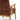 Vintage brown leather armchair with wooden frame on a white background