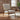 Chair with wooden frame and natural linen cushion in modern living room