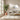 Modern living room with a beige sofa, wooden coffee table, and decorative items.